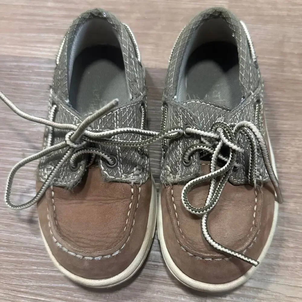 Brown olive green boat